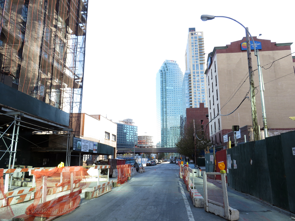 Crescent Street looking southwest, with 42-15 Crescent under construction on the left and 42-14 on the right