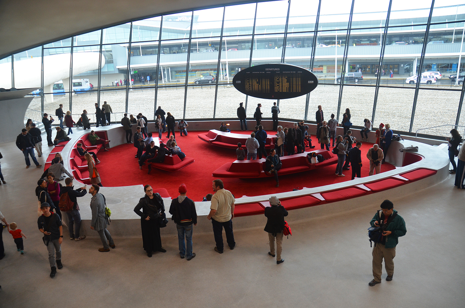 Visitors inside the TWA Flight Center during Open House New York Weekend in October 2014. Photograph by Evan Bindelglass.