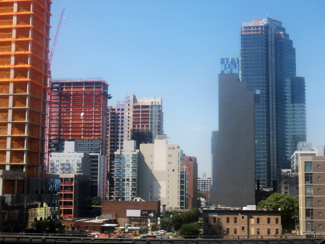 Looking southwest from Queens Plaza. Under-construction projects: 28-10 Jackson Avenue (far left), Eagle Lofts (bottom left), 44-26 Purves Street (left), The Edison at 29-21 44th Drive (center left), Watermark Court Square at 27-19 44th Drive (center), Aloft Long Island City (center right), The Hayden at 43-25 Hunter Street (right), and Hyatt Place (bottom right).