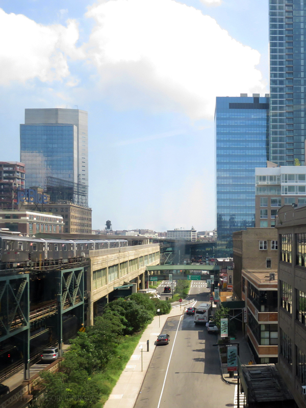 Looking east along Queens Plaza South. 24-16 Queens Plaza South, visible in the center, would rise about as high as Two Gotham Center in the center background. August 2016.
