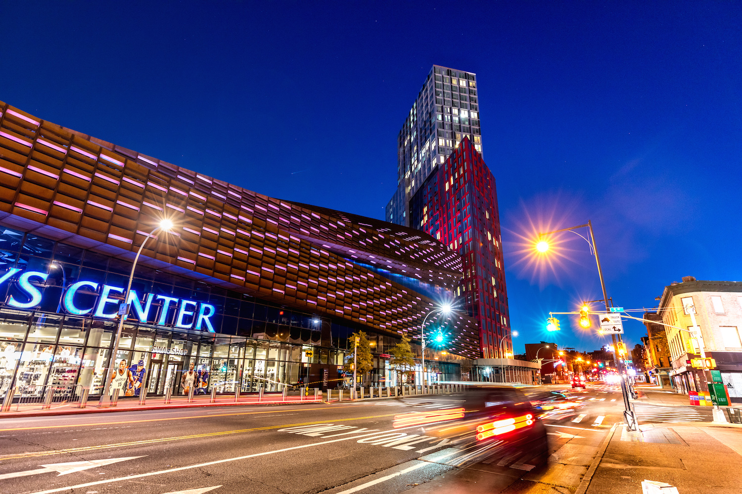 Night-time view of the Barclays Center and 461 Dean Street.