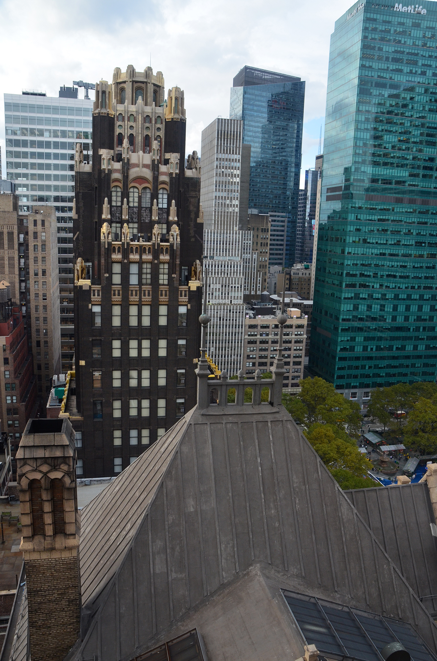 The Bryant Park Hotel and 24 West 40th Street as seen from The Bryant