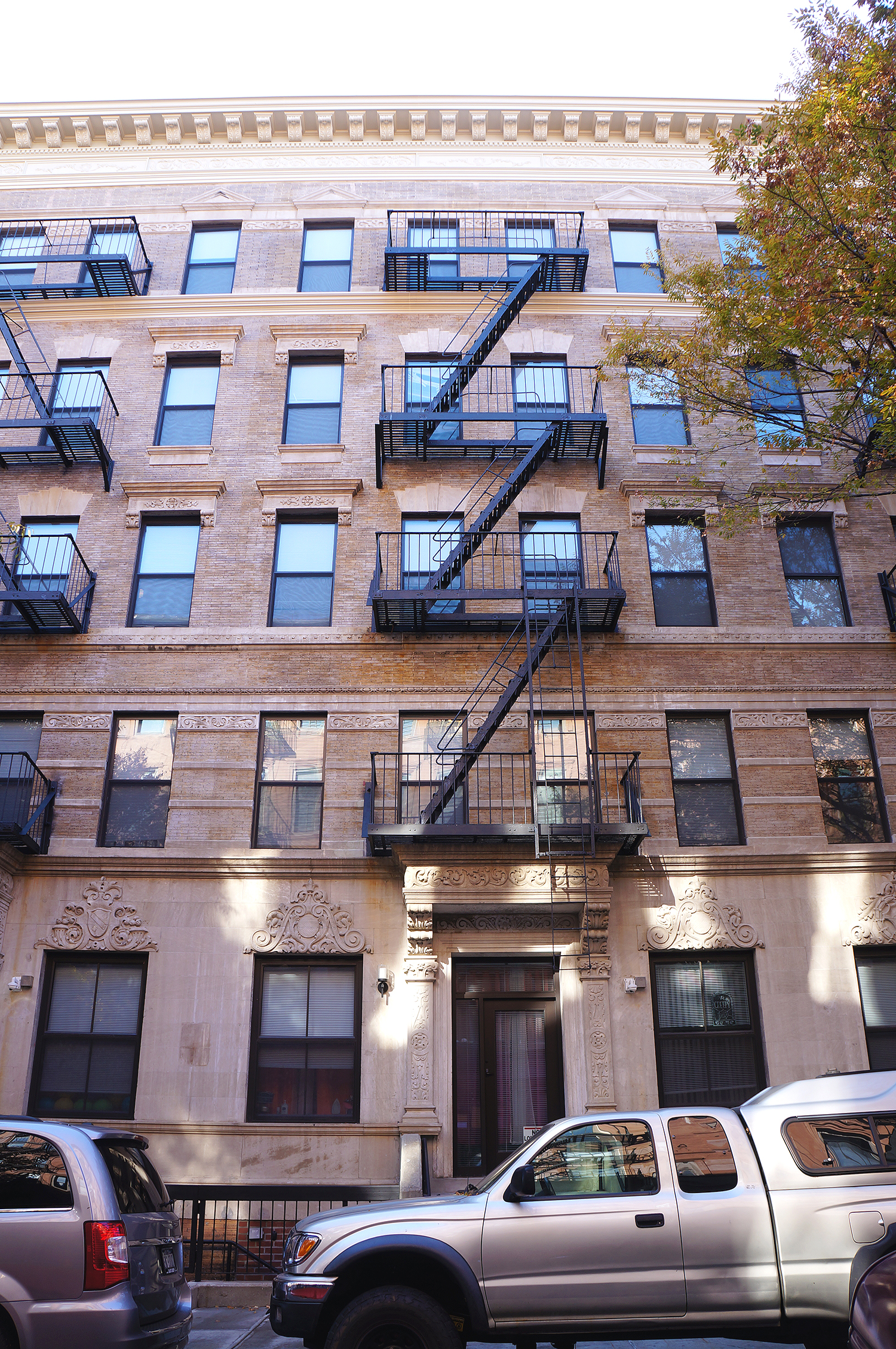 The renovated Randolph Houses tenements on the south side of 114th Street. photo by Rebecca Baird-Remba