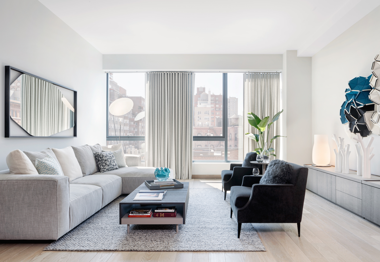 The living room in a seventh floor model unit at 90 Lexington Avenue. photo via HFZ Capital