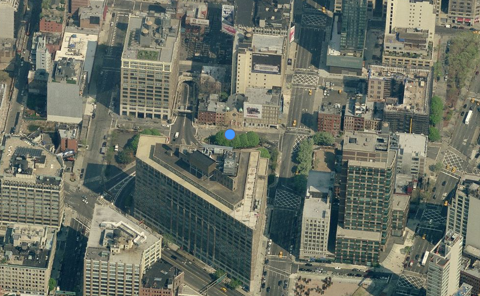 568 Broome Street, site composed of the church above the blue dot and the walk-up to the left; overhead shot from Bing Maps