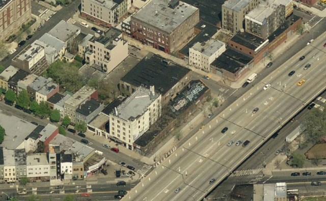 308 North 7th Street (L-shaped industrial buildings hugging white apartment building), image from Bing Maps