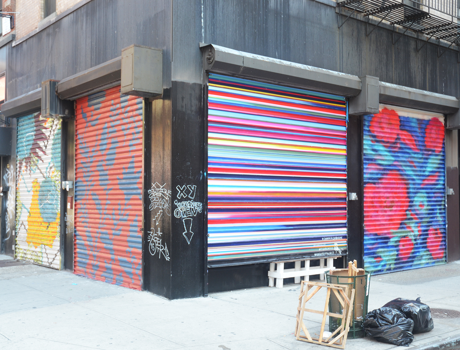 Examples of 100 Gates at 81 Hester Street. From left to right, artwork by Kim Carlino, Oksana Prokopenko (unfinished), Chamberlin Newsome, and Oksana Prokopenko. All photographs by the author