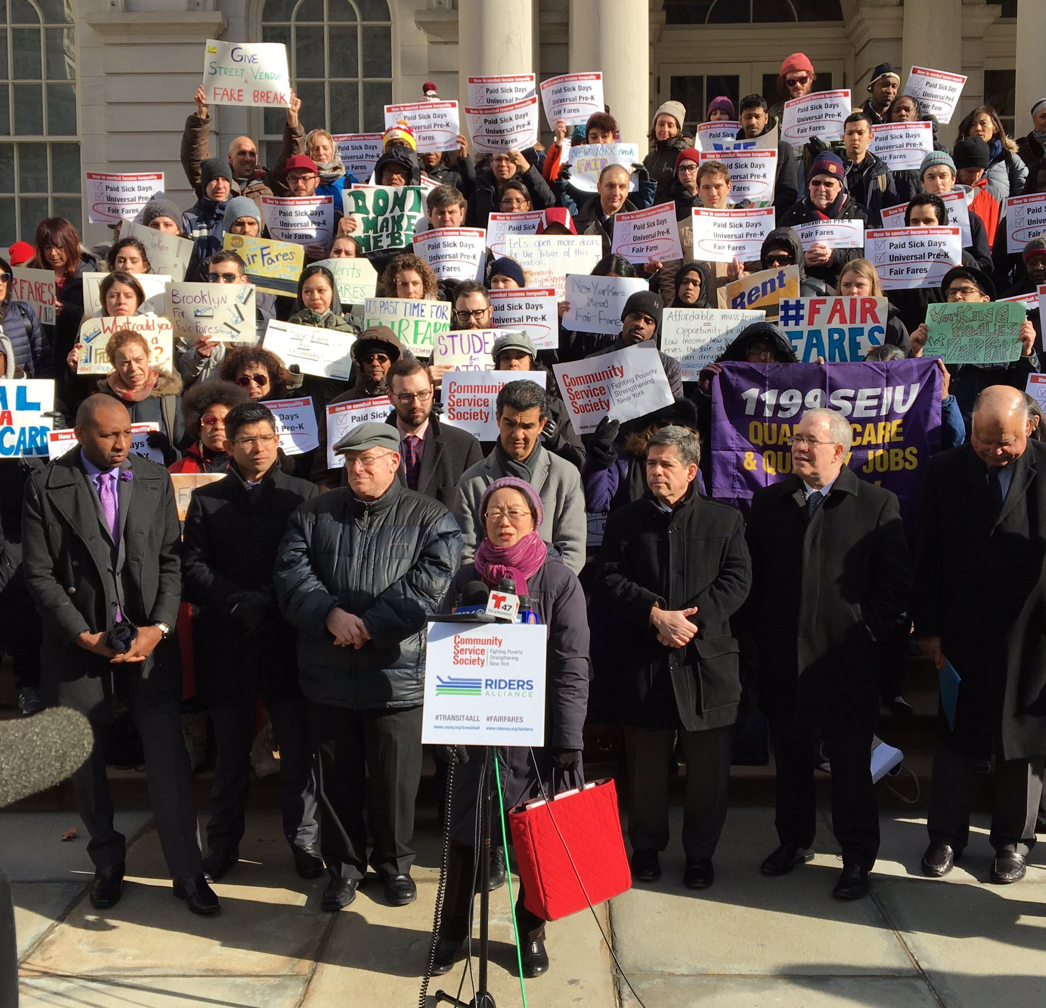 Councilwoman Margaret Chin speaks during a rally for reduced fare MetroCards this morning in front of City Hall. photo via