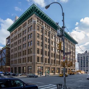 Rendering illustrates 260 Eleventh Avenue from the corner of 27th Street and 11th Avenue - Rogers Stirk Harbours + Partners