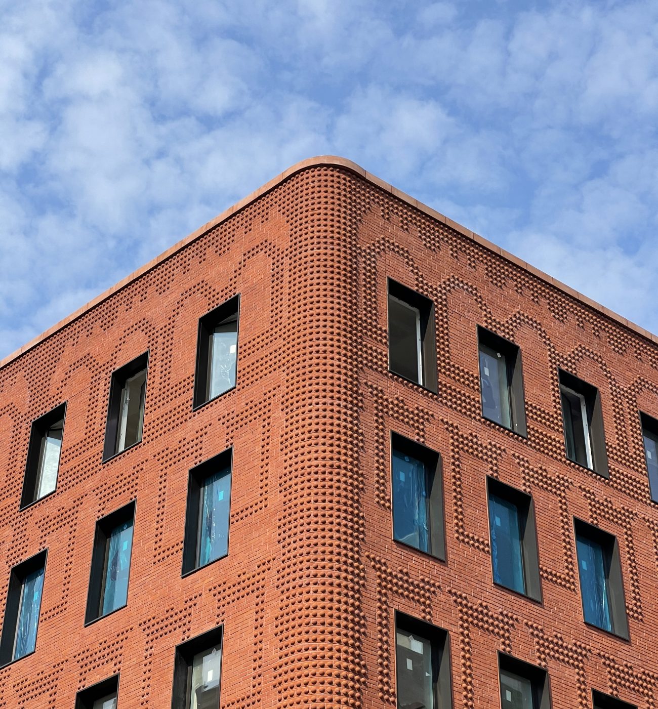 The Grand Mulberry uses custom-formed brick on a New York facade