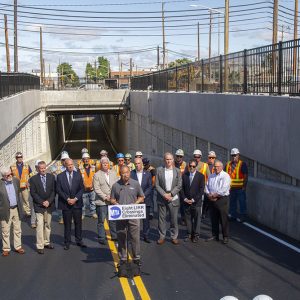 Long Island Rail Road President Phillip Eng (front) addresses members of the press at the WIllis Avenue LIRR station - Metropolitan Transportation Authority of the State of New York