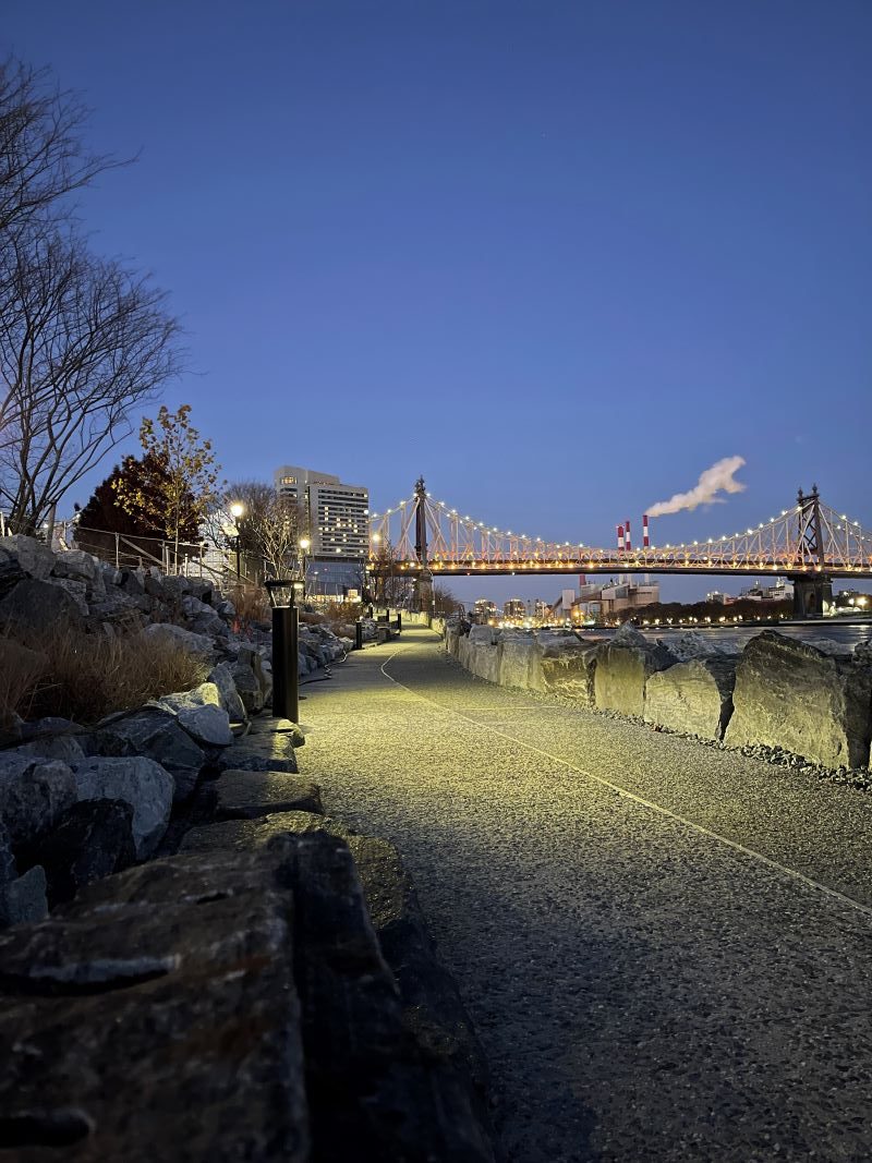Evening view of new pedestrian walkway at Roosevelt Island's Southpoint Park