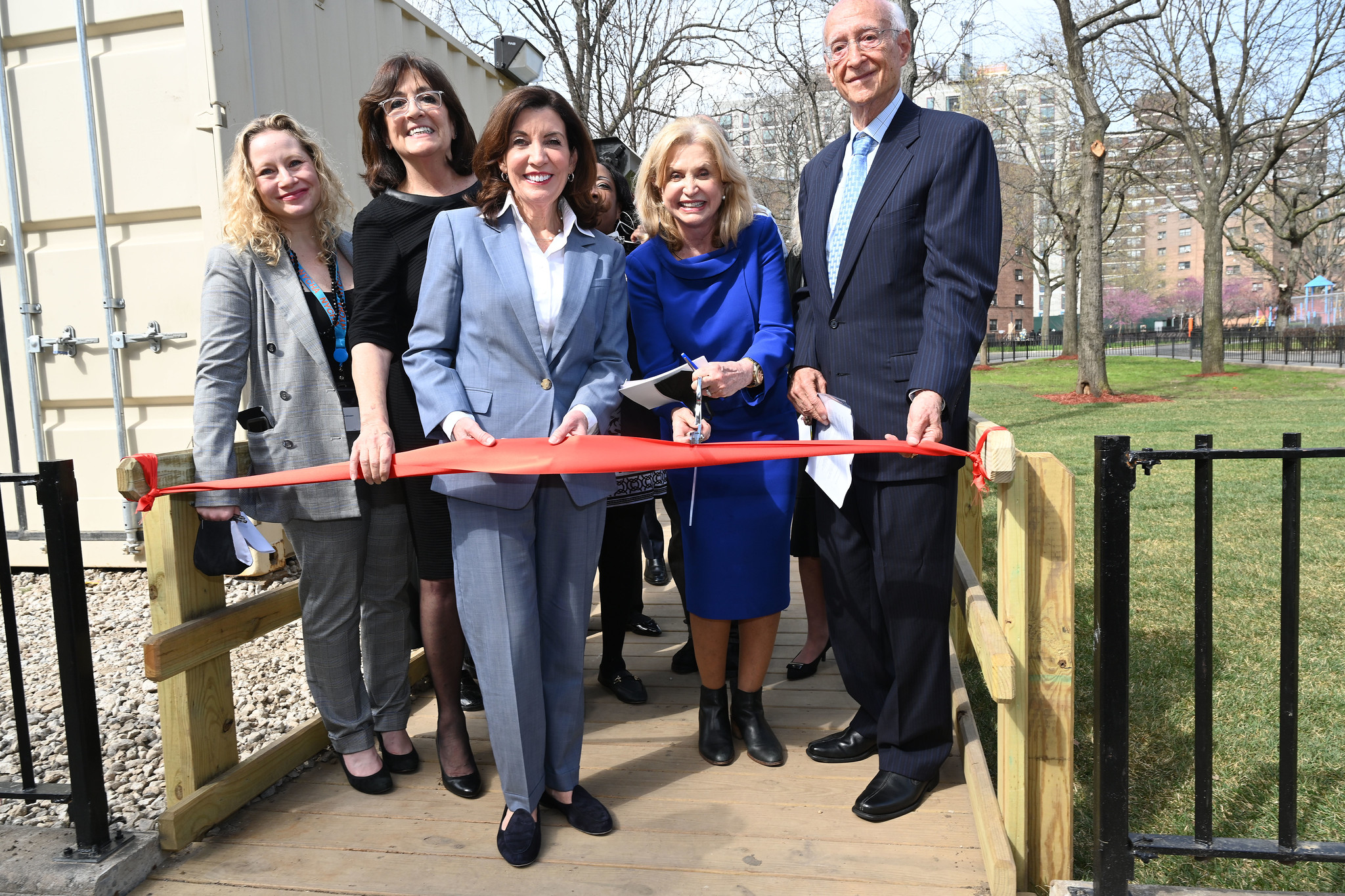 Governor Kathy Hochul [center] at a ribbon cutting ceremony for the new Astoria Houses facility - Courtesy of Kevin P. Coughlin, Office of Governor Kathy Hochul