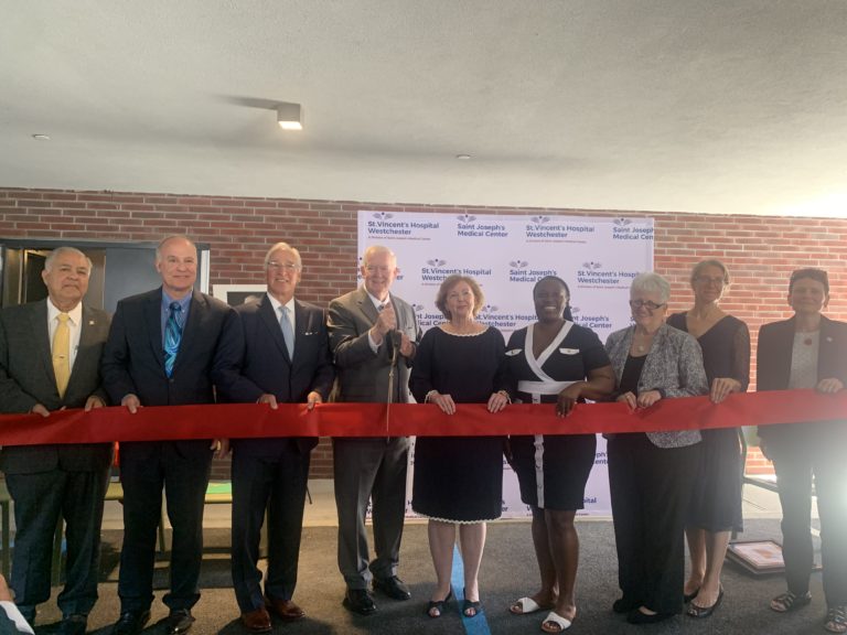 Ribbon cutting ceremony at Landy Court - From left: Assemblyman Nader Sayegh; Ralph Fasano, CEO, Concern Housing; Michael Spicer, CEO, St. Joseph’s Medical Center; Jim Landy; Lorraine Horgan, St. Joseph’s Medical Center; Yonkers City Council President Lakisha Collins-Bellamy; Dr. Ann Sullivan, commissioner, Office of Mental Health; RuthAnne Visnauskas, commissioner, Homes and Community Renewal; Brenda McAteer, Office of Temporary and Disability Assistance