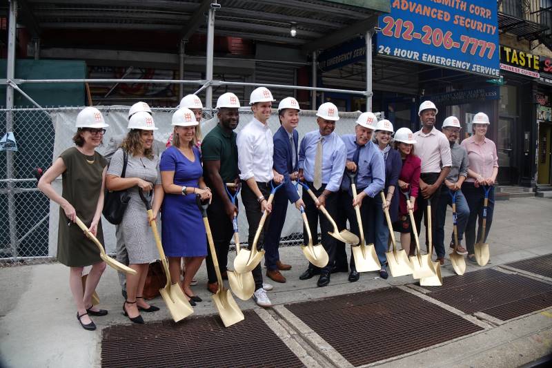 Project teams celebrate the commencement of construction at 201-207 7th Avenue