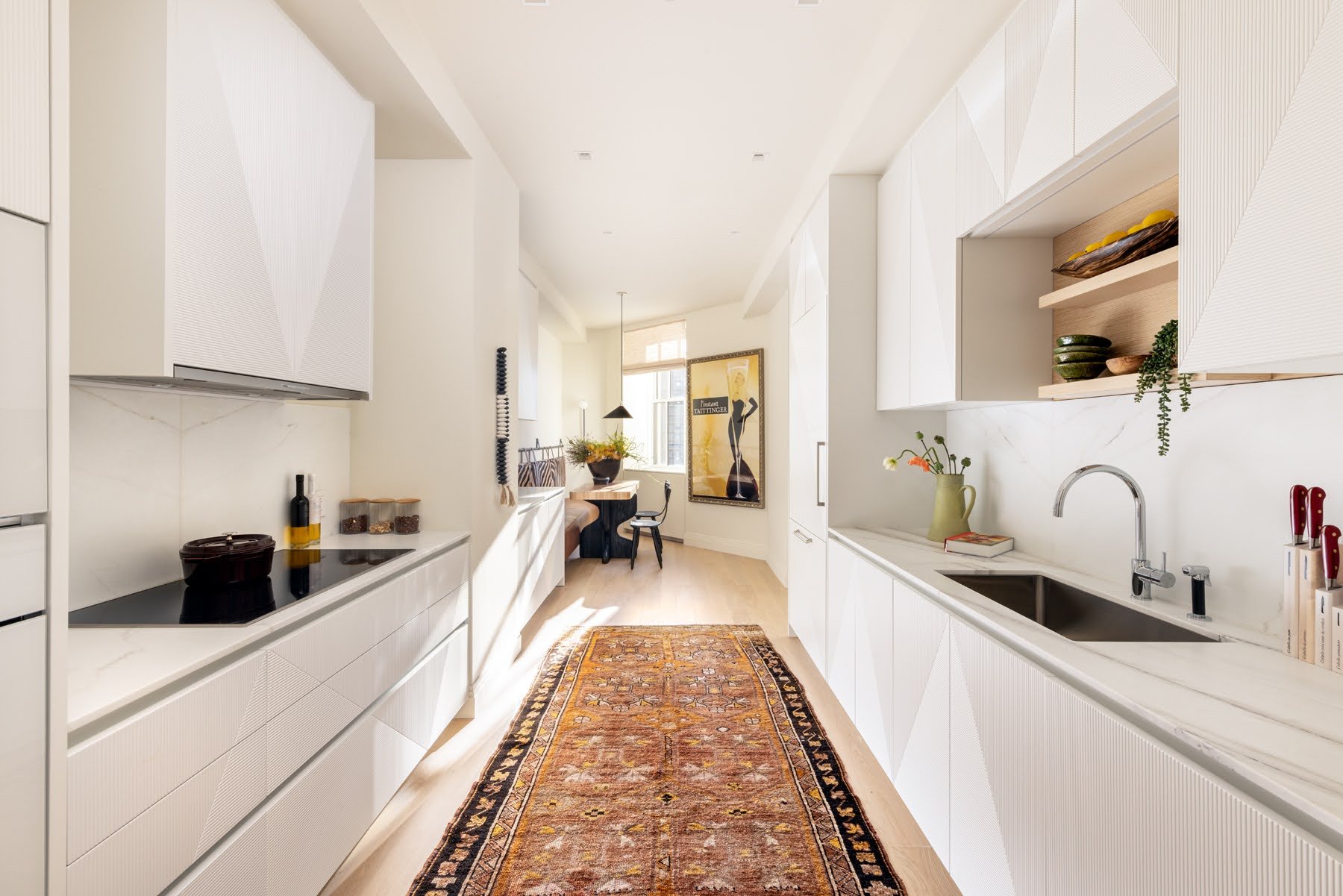 Model Kitchen and living areas at One Wall Street, staged by Yellow House - Photo by Evan Joseph for Macklowe Properties