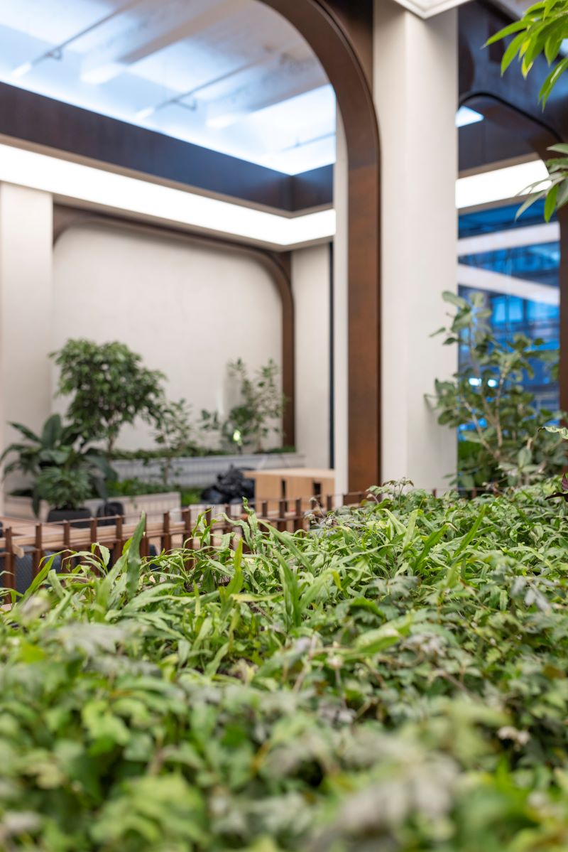 Lush green spaces within the 295 Fifth Avenue lobby