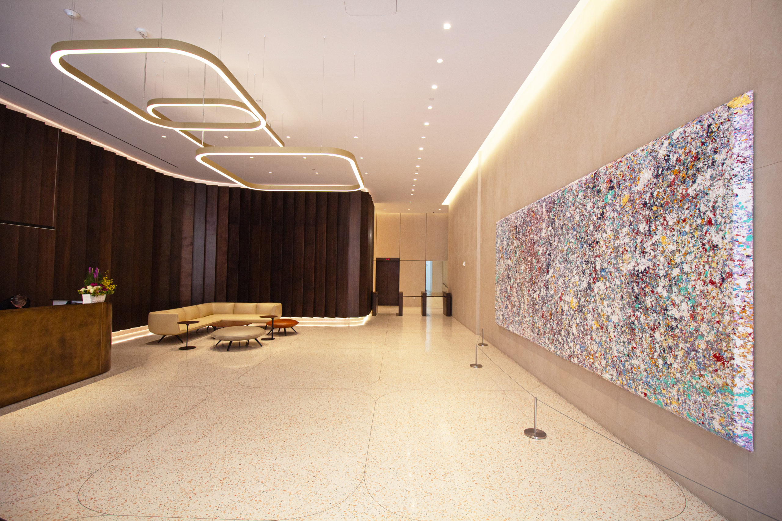 The sleek new lobby and painting by For The 'Friend' (2022) - Painted by Sam Gilliam at 122 Fifth Avenue in Manhattan