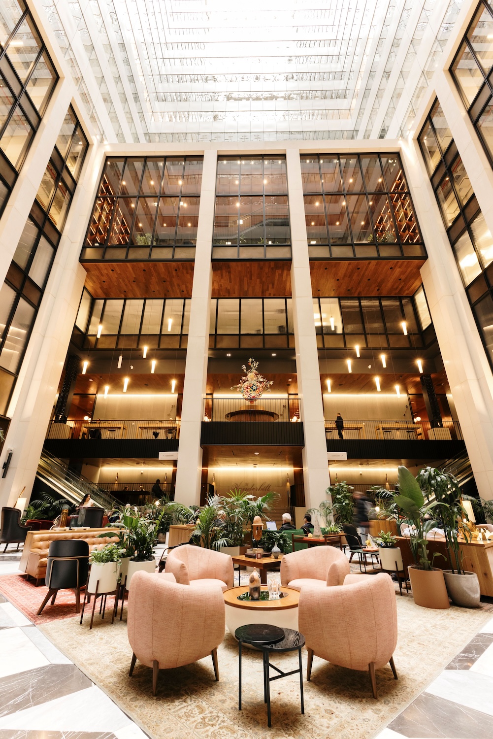 Photograph of the Palm Court lobby with 29-story atrium and direct connection to Grand Central Station, by Sophia Sahara
