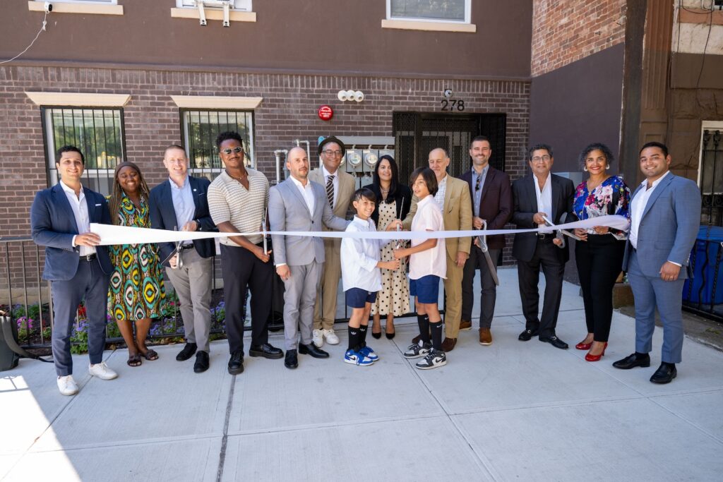 Photograph of ribbon cutting, via nyc.gov.
