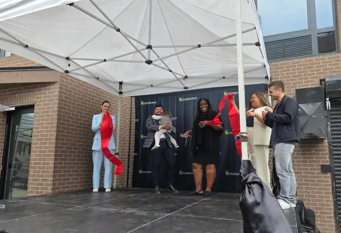 The ribbon cutting for 19 & 21 East 198th Street.